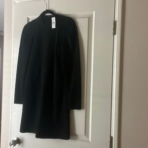 Brand new (with tag) Ann Taylor size 2 black lined dress, knee length.